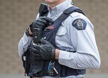 An RCMP officer wears a body camera at the detachment in Bible Hill, N.S., on Sunday, April 18, 2021. A Calgary criminologist says Alberta's plan to make all police services in the province use body cameras could come with prohibitive costs and take a long time to put in place. THE CANADIAN PRESS/Andrew Vaughan