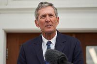 Manitoba Premier Brian Pallister announces that he will not be seeking re-election in front of the Dome Building in Brandon, Man., Tuesday, Aug. 10, 2021. THE CANADIAN PRESS/David Lipnowski