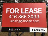 RioCan signage is shown at a strip mall in Mississauga, Ont., Saturday, Oct.24., 2020. THE CANADIAN PRESS/Richard Buchan