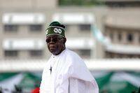 FILE PHOTO: Nigeria's President Bola Tinubu looks on after his swearing-in ceremony in Abuja, Nigeria May 29, 2023. REUTERS/Temilade Adelaja/File Photo