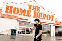 People walk through a Home Depot parking lot  in Whitby, Ont., on Thursday, May 28, 2020.   (Christopher Katsarov/The Globe and Mail)