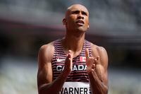 Damian Warner, of Canada, reacts as he wins a heat in the men's decathlon 100-meter at the 2020 Summer Olympics, Wednesday, Aug. 4, 2021, in Tokyo. (AP Photo/Petr David Josek)