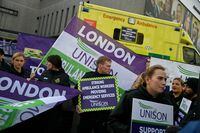FILE PHOTO: Ambulance workers strike outside their Waterloo station, amid a dispute with the government over pay, in London, Britain January 11, 2023. REUTERS/Toby Melville