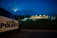 Stratford Police sit outside the Stratford Festival's Festival Theater after a bomb threat caused the cancellation of the opening night performance of "The Tempest" in Stratford, Ont., on Monday, May 28, 2018. THE CANADIAN PRESS/Geoff Robins