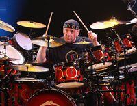 LOS ANGELES, CA - MAY 06: Musician Neil Peart of the band Rush performs at the Nokia Theatre on May 6, 2008 in Los Angeles, California.  (Photo by Jesse Grant/Getty Images)