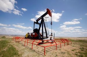 FILE PHOTO: A Canadian Natural Resources pump jack pumps oil out of the ground near Dorothy, Alberta, Canada, June 30, 2009. REUTERS/Todd Korol/File Photo