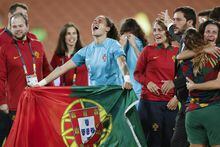 Portugal players celebrate after defeating Cameroon in their FIFA women's World Cup qualifier in Hamilton, New Zealand, Wednesday, Feb. 22, 2023. (Martin Hunter/Photosport via AP)