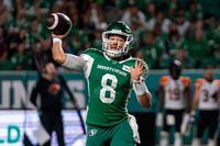 Saskatchewan Roughriders quarterback Mason Fine (8) throws against BC Lions during the fourth quarter of CFL football action against BC Lions in Regina on Friday, August 19, 2022. THE CANADIAN PRESS/Heywood Yu