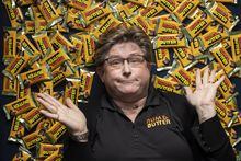 Owner of Canadian Candy Nostalgia Crystal Regehr Westergard with some of the over 130,000 Rum&Butter chocolate bars she needs to re-home, in Camrose , Alberta on Thursday, April 6, 2023. Pandemic issues caused her orders to be delayed and then manufactured all at once. She started the company with Cuban Lunch to delight her mother, who has dementia, and later added her husband's favourite nostalgic candy, Rum&Butter.  Amber Bracken for The Globe and Mail