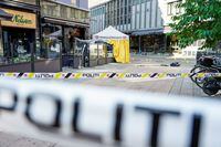 View of a taped-off area following a shooting at a nightclub in central Oslo, Norway June 25, 2022. Terje Pedersen/NTB/via REUTERS   ATTENTION EDITORS - THIS IMAGE WAS PROVIDED BY A THIRD PARTY. NORWAY OUT. NO COMMERCIAL OR EDITORIAL SALES IN NORWAY.