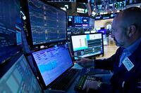 Specialist James Denaro works at his post on the floor of the New York Stock Exchange, Wednesday, Nov. 15, 2023. Wall Street is ticking higher Wednesday and adding a bit more to its big rally from a day before. (AP Photo/Richard Drew)