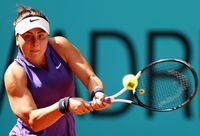 MADRID, SPAIN - APRIL 29: Bianca Andreescu of Canada plays a double-handed backhand shot in their first round match against Alison Riske of United States during day two of the Mutua Madrid Open at La Caja Magica on April 29, 2022 in Madrid, Spain. (Photo by Clive Brunskill/Getty Images)