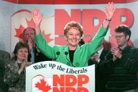 (CPT103) TORONTO, MAY 27--NDP leader Alexa McDonough waves to supporters at a breakfast meeting with party faithfull Tuesday in Toronto. McDonough spent the morning campaigning in the Toronto area before flying to British Columbia. (CP PHOTO) 1997 (str/Moe Doiron)md