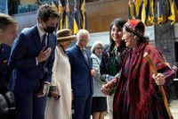 Canadian Prime Minister Justin Trudeau greets Indigenous leaders as Prince Charles and Camilla, Duchess of Cornwall are welcomed in St. John's, Newfoundland and Labrador, to begin a three-day Canadian tour, May 17, 2022. (Photo by PAUL CHIASSON/POOL/AFP via Getty Images)