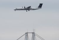 A Porter airplane lands in Toronto on Wednesday, March 18, 2020. THE CANADIAN PRESS/Nathan Denette