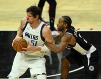 Jun 2, 2021; Los Angeles, California, USA; Los Angeles Clippers forward Kawhi Leonard (2) fouls Dallas Mavericks center Boban Marjanovic (51) during the second half of game 5 of round one of the 2021 NBA Playoffs at Staples Center. Mandatory Credit: Jayne Kamin-Oncea-USA TODAY Sports