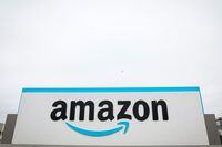 FILE PHOTO: The Amazon logo is displayed on a sign outside the company's LDJ5 sortation center, as employees begin voting to unionize a second warehouse in the Staten Island borough of New York City, U.S. April 25, 2022.  REUTERS/Brendan McDermid.