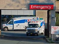 Paramedics are seen at the Dartmouth General Hospital in Dartmouth, N.S. on Thursday, July 4, 2013. Nova Scotia Health is warning the public to expect delays in emergency room and ambulance service over the holiday long weekend because of staffing shortages.THE CANADIAN PRESS/Andrew Vaughan