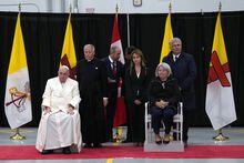 Pope Francis and Gov. Gen. Mary Simon watch a traditional dance during the final public event of his papal visit across Canada as he prepares to leave Iqaluit, Nunavut on Friday, July 29, 2022. THE CANADIAN PRESS/Nathan Denette