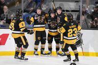 Hamilton Bulldogs' Avery Hayes, centre, celebrates his power play goal with teammates during the first period of Memorial Cup hockey action against the Edmonton Oil Kings in Saint John, N.B. on Friday, June 24, 2022. THE CANADIAN PRESS/Darren Calabrese