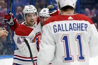 Montreal Canadiens center Jordan Weal (43) celebrates his goal against the Tampa Bay Lightning with left wing Tomas Tatar (90) and right wing Brendan Gallagher (11) during the third period of an NHL hockey game Saturday, Dec. 28, 2019, in Tampa, Fla. (AP Photo/Chris O'Meara)