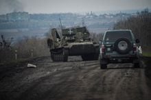 Ukrainian service members ride military vehicles, as Russia's attack on Ukraine continues, near the front line city of Bakhmut, Ukraine April 6, 2023. REUTERS/Oleksandr Klymenko