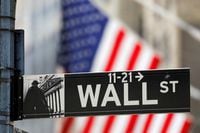 A street sign for Wall Street is seen outside the New York Stock Exchange (NYSE) in New York City on July 19.
