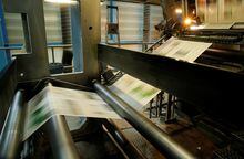 The Journal de Morges newspaper is being printed in the KBA rotary press at the Lausanne Printing Center (Centre d'Impression Lausanne), owned by Tamedia, in Bussigny, Switzerland, May 3, 2018. REUTERS/Denis Balibouse