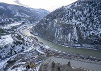 A large section of Highway 1 and a bridge is seen washed out near Spences Bridge, B.C. Thursday, December 9, 2021. Highway 1 between Kanaka Bar and Spences Bridge in the Fraser Canyon has been reopened to traffic two months after parts of it were washed away in torrential storms. THE CANADIAN PRESS/Jonathan Hayward