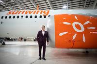 Stephen Hunter, CEO of Sunwing Travel, is photographed beside one of the company's aircraft in the Sunwing hangar at Toronto Pearson International Airport, on Feb 8 2021.    ***PHOTOS EMBARGOED UNTIL 8:15am FEB 9 ***