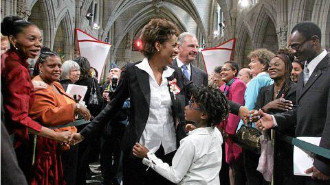 In September, 2005, Michaelle Jean, newly sworn in as Governor General greets people in the Hall of Honour on Parliament Hill, with her then-six year-old daughter Marie-Eden Jean, in front, and then-Prime Minister Paul Martin in back.