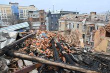 The debris of a residential building, partially destroyed after a missile strike on Kharkiv on January 30, 2023, amid the Russian invasion of Ukraine. (Photo by SERGEY BOBOK / AFP) (Photo by SERGEY BOBOK/AFP via Getty Images)