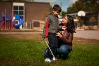Claudine Santos, president of the Ontario Parents of Visually Impaired Children, and her son Willam outside a school in Ottawa, Ontario, on September 19th 2020. Claudine recently spoke at a special education meeting at the Ottawa school board regarding issues of self contained classes. Kamara Morozuk / The Globe and Mail