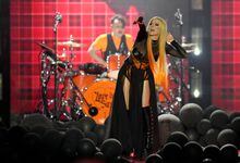 Avril Lavigne performs during the Juno Awards in Toronto on Sunday, May 15, 2022. Toronto pop star the Weeknd leads the Juno Award nominees with six nods, while Calgary newcomer Tate McRae and Napanee, Ont. native Lavigne are tied with five each.THE CANADIAN PRESS/Nathan Denette