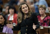 Deputy Prime Minister and Minister of Finance Chrystia Freeland rises during Question Period, in Ottawa, Monday, Dec. 4, 2023. Finance Minister Chrystia Freeland has approved RBC's $13.5-billion takeover of HSBC Canada despite calls from opposition politicians and other groups to block it.THE CANADIAN PRESS/Adrian Wyld