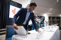 Liberal candidate for Vancouver-Granville, Taleeb Noormohamed, takes his seat before an all candidates town hall meeting in Vancouver on October 10, 2019. THE CANADIAN PRESS/Darryl Dyck