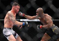 Nov 6, 2021; New York, NY, USA; Kamaru Usman (red gloves) competes against Colby Covington (blue gloves) during UFC 268 at Madison Square Garden. Mandatory Credit: Ed Mulholland-USA TODAY Sports