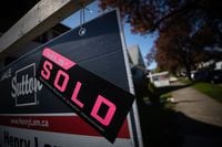 A sold sticker is seen on a for sale sign outside a house that was sold in east Vancouver, on Wednesday, April 15, 2020. Darryl Dyck/The Globe and Mail