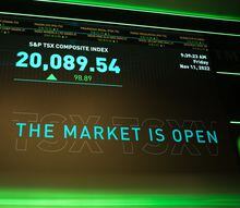 The S&P TSX composite index screen at the TMX Market Centre in downtown Toronto is photographed on Friday, November 11, 2022. THE CANADIAN PRESS/ Tijana Martin