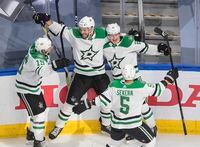 Dallas Stars' Blake Comeau (15) Jamie Oleksiak (2), Joel Kiviranta (25) and Andrej Sekera (5) celebrate the game winning goal against the Colorado Avalanche during overtime NHL Western Conference Stanley Cup playoff action in Edmonton on Friday, September 4, 2020.