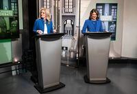 Leader of the NDP Rachel Notley, left, and Leader of the United Conservative Party Danielle Smith prepare for a debate in Edmonton on Thursday, May 18, 2023. THE CANADIAN PRESS/Jason Franson.