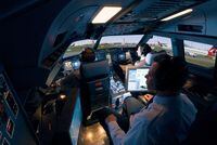 A CAE civil aviation cockpit simulator.CAE handoutTrueª Environment simulator.CAE 
