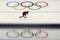 FILE - A Chinese athlete warms up before the start of the men's speedskating 1,500-meter race at the 2022 Winter Olympics, Tuesday, Feb. 8, 2022, in Beijing. o hear the world’s Olympic leaders tell it, the bidding for future Winter Games has been jumbled by internal disputes at India’s Olympic committee, a newfound affinity for streamlining the bidding process and, most recently, a long-overdue nod to the impact of climate change. (AP Photo/Ashley Landis, File)