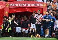 FILE PHOTO: Soccer Football - Premier League - Manchester United v Brighton & Hove Albion - Old Trafford, Manchester, Britain - August 7, 2022  Manchester United's Cristiano Ronaldo, Tom Heaton and teammates walk to the substitute bench before the match REUTERS/Toby Melville