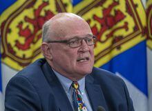 Dr. Robert Strang, Nova Scotia's chief medical officer of health, fields a question at a COVID-19 briefing in Halifax on Tuesday, Dec. 7, 2021. Strang says the province will soon be treating COVID-19 like any other respiratory illnesses. THE CANADIAN PRESS/Andrew Vaughan
