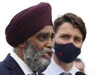 Minister of National Defence Harjit Sajjan answers a reporters question as he joins Liberal Leader Justin Trudeau for a campaign event in downtown Vancouver, B.C., on August 18, 2021. THE CANADIAN PRESS/Sean Kilpatrick