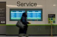 A commuter walks through Union Station in Toronto, April 20, 2022. THE CANADIAN PRESS/Yader Guzman