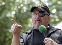 FILE - Stewart Rhodes, founder of the citizen militia group known as the Oath Keepers speaks during a rally outside the White House in Washington, on June 25, 2017. Federal prosecutors on Monday, Oct. 3, 2022, will lay out their case against the founder of the Oath Keepers' extremist group and four associates charged in the most serious case to reach trial yet in the Jan. 6, 2021, U.S. Capitol attack. (AP Photo/Susan Walsh, File)