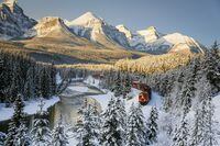 A Canadian Pacific freight train travels around Morant's Curve in the Rocky Mountains near Baker Creek, Alta., Friday, Dec. 3, 2021.&nbsp;Canadian Pacific Railway Ltd. says shareholders have given a big thumbs-up to its deal to buy U.S. railway Kansas City Southern. THE CANADIAN PRESS/Jeff McIntosh