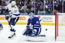 Toronto Maple Leafs goaltender Ilya Samsonov (35) makes a save on a tip by Tampa Bay Lightning forward Alex Killorn (17) during first period NHL Stanley Cup playoff hockey action in Toronto on Thursday, April 27, 2023. THE CANADIAN PRESS/Nathan Denette